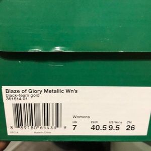 Puma blaze of glory black and gold sneakers